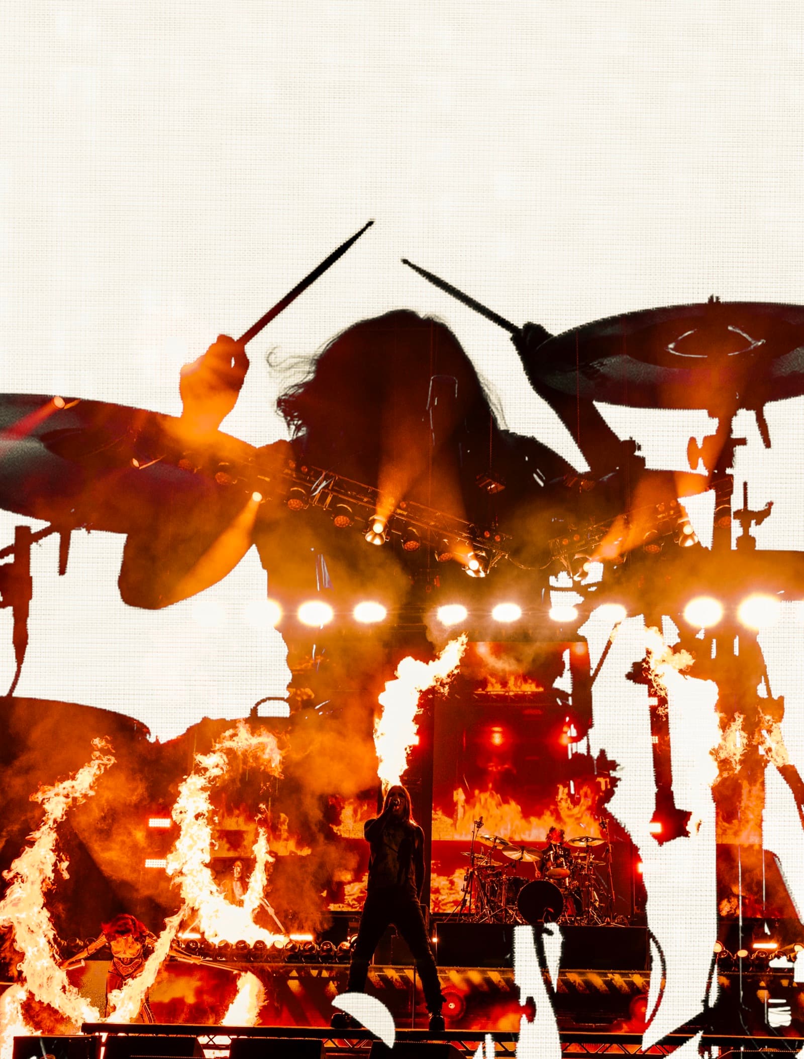 Motionless in White drummer silhouette with fire